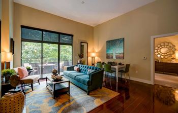 Living room with oversized windows allows abundance of natural light